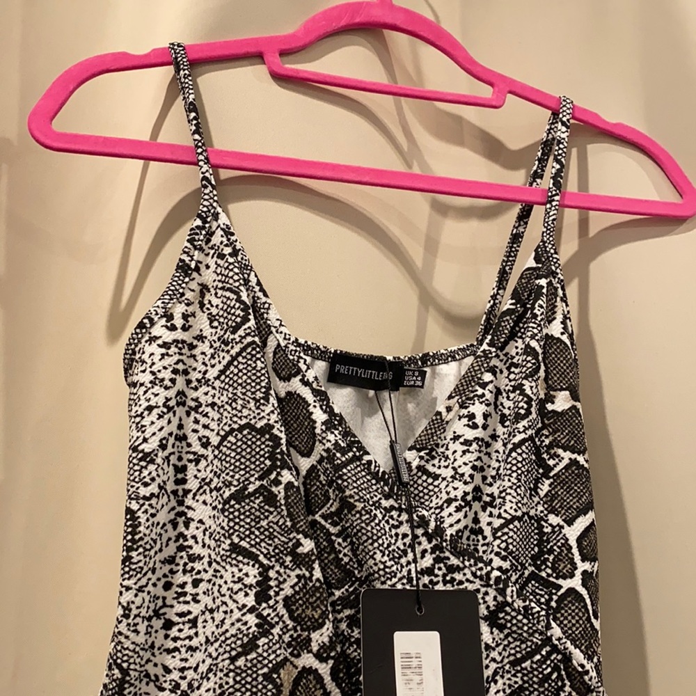 Snake skin romper from pretty little thing